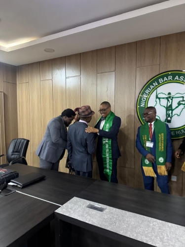 National President AELN Prof S C.DikePhD,FGAN decorated Present of NBA,Mazi Afam Osigwe with Fellow Green Advocate of Nigeria in Abuja today