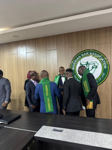 National President AELN Prof S C.DikePhD,FGAN decorated Present of NBA,Mazi Afam Osigwe with Fellow Green Advocate of Nigeria in Abuja today