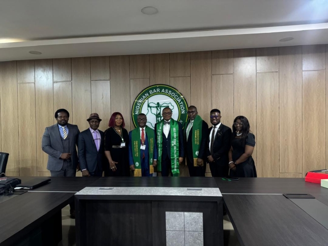 National President AELN Prof S C.DikePhD,FGAN decorated Present of NBA,Mazi Afam Osigwe with Fellow Green Advocate of Nigeria in Abuja today