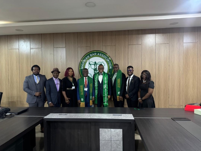 National President AELN Prof S C.DikePhD,FGAN decorated Present of NBA,Mazi Afam Osigwe with Fellow Green Advocate of Nigeria in Abuja today